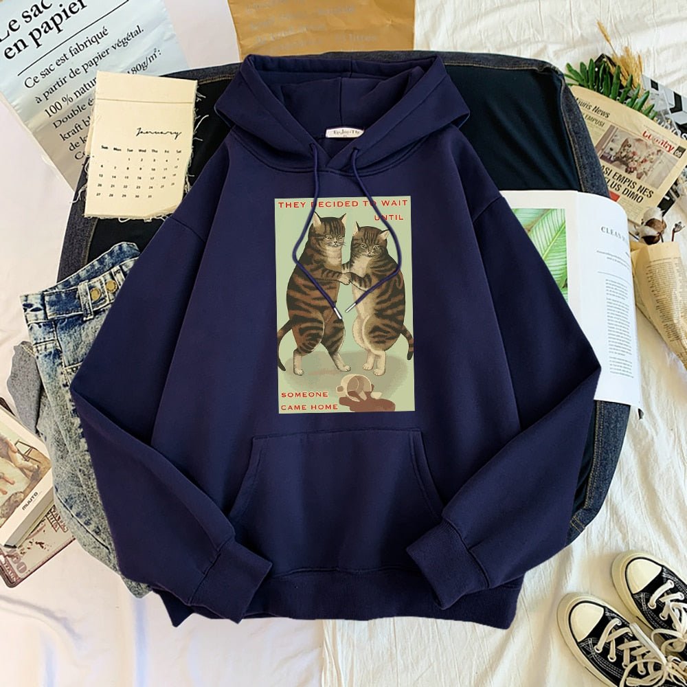 navy blue mens cat hoodie with a picture of two cats looking scared because they spilled coffee but wanting to blame other people