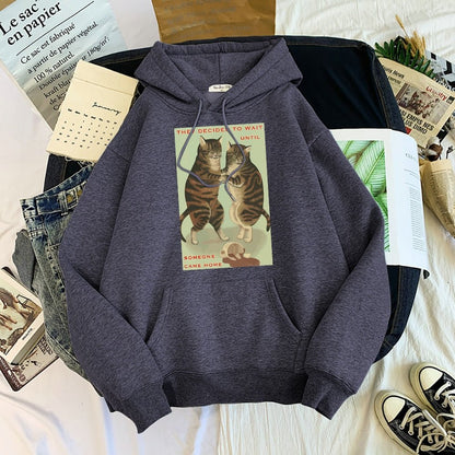 dark grey cat hoodie with funny message of cats wanting to blame human for the spilled coffee which is hilarious