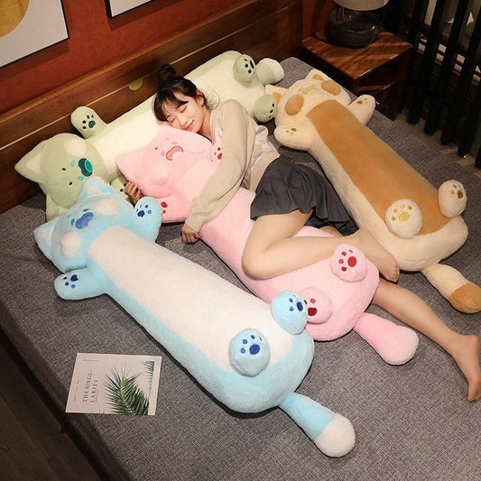a lady sleeping with a long cat plushie from different colors
