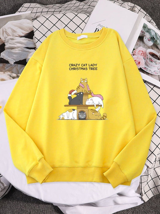 a yellow color cat sweatshirts for women with cats on cat tower design for christmas gift for cat lover