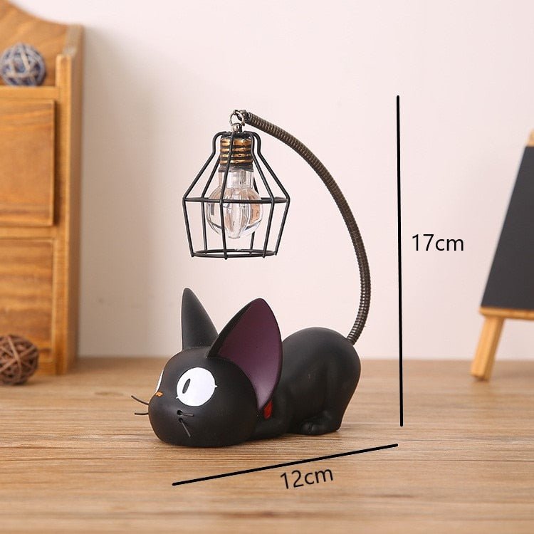 a cute cat sculpture with lamp for home decor