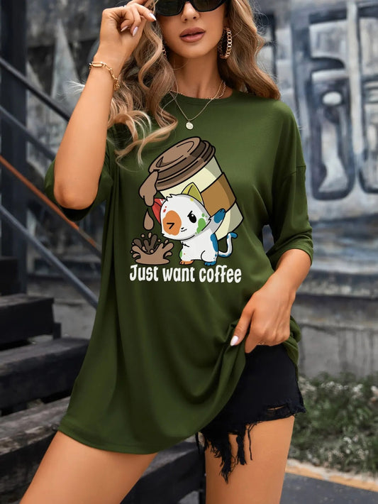 Colorful paint-splattered cat holding a coffee cup on dark green t shirt
