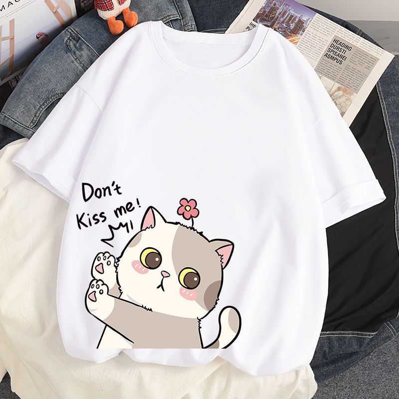 a white color t shirt featuring a cat cartoon kiss me that looks really funny