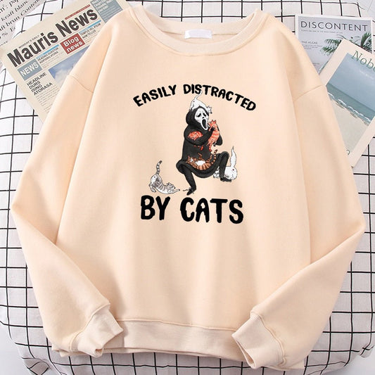 a funny cat sweatshirts with a picture of a ghost getting distracted by cats