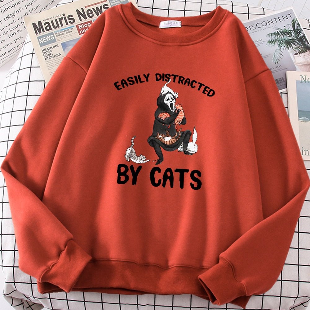 a red cat lover sweatshirt with picture of ghost playing with cats