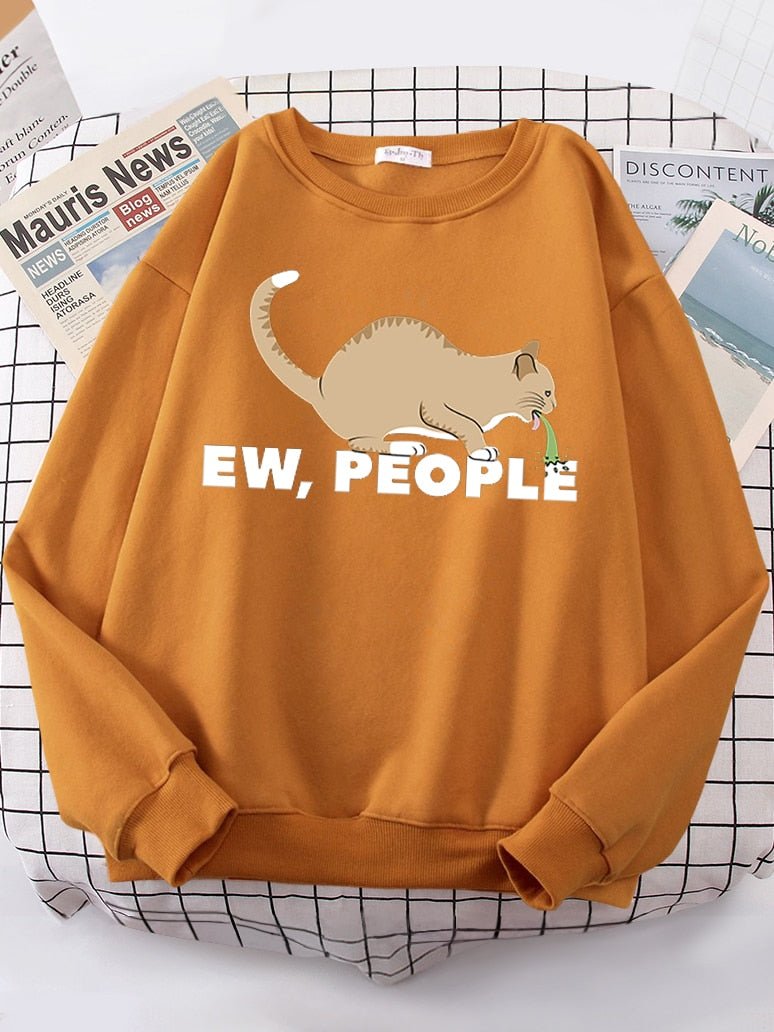 an orange color sweatshirt with cat puking because its annoyed with human