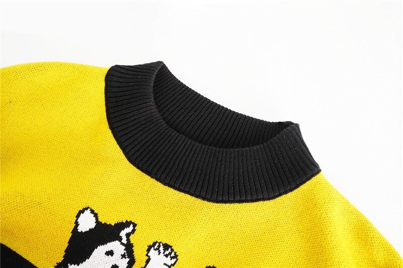 a closeup of a cute cat sweatshirt with cats design