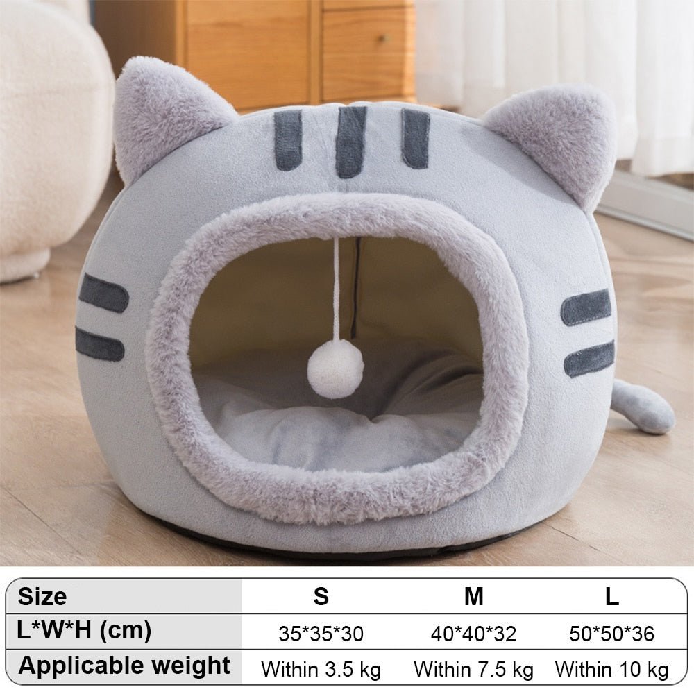 grey color bedding made for pets that comes with interactive ball toy for cats to play with