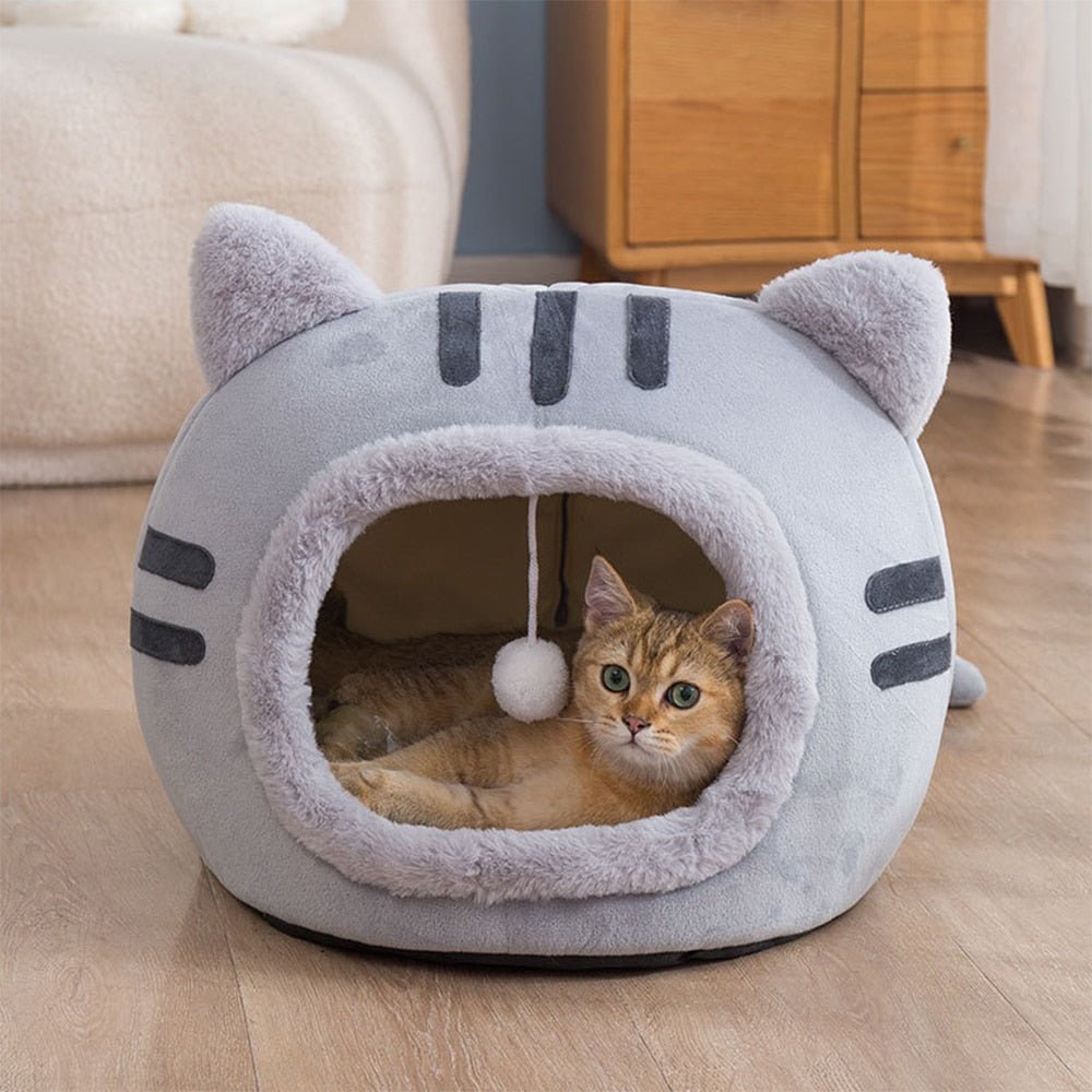 a cute enclosed bedding for cats that comes with an interactive ball toy in grey color