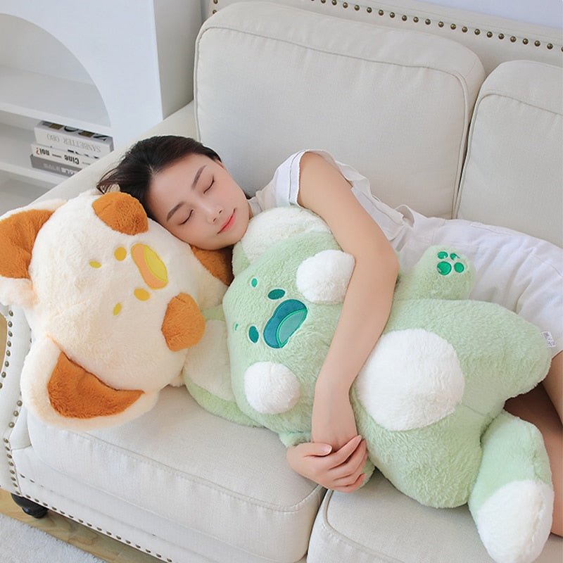 a lady hugging a big cat plushie in green color