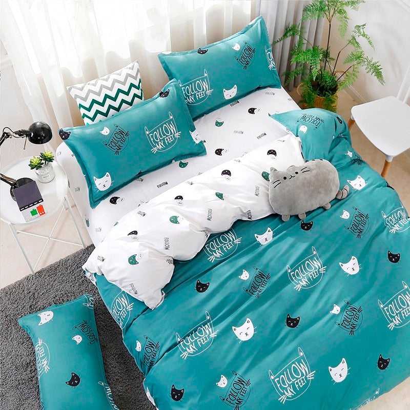 queen size duvet set that comes with pillowcase and bed sheet and with cartoon cat designs