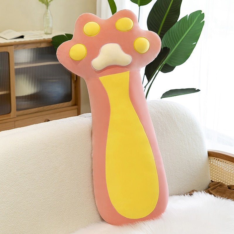 a pink paw shaped kawaii cat plush