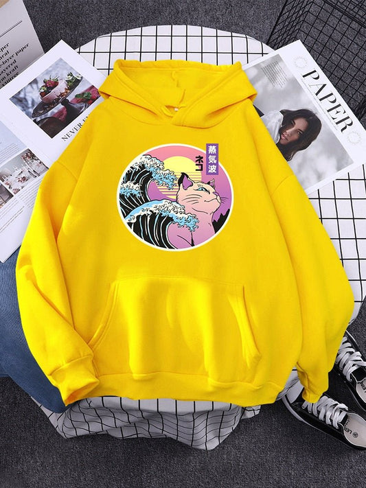 yellow hoodie featuring a cat and tsunami waves