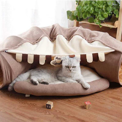 modern looking bedding made for pets that comes with a tunnel and interactive toys