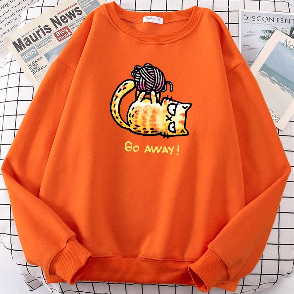 an orange color cat themed sweatshirt with a picture of a grumpy cat playing with yarn ball