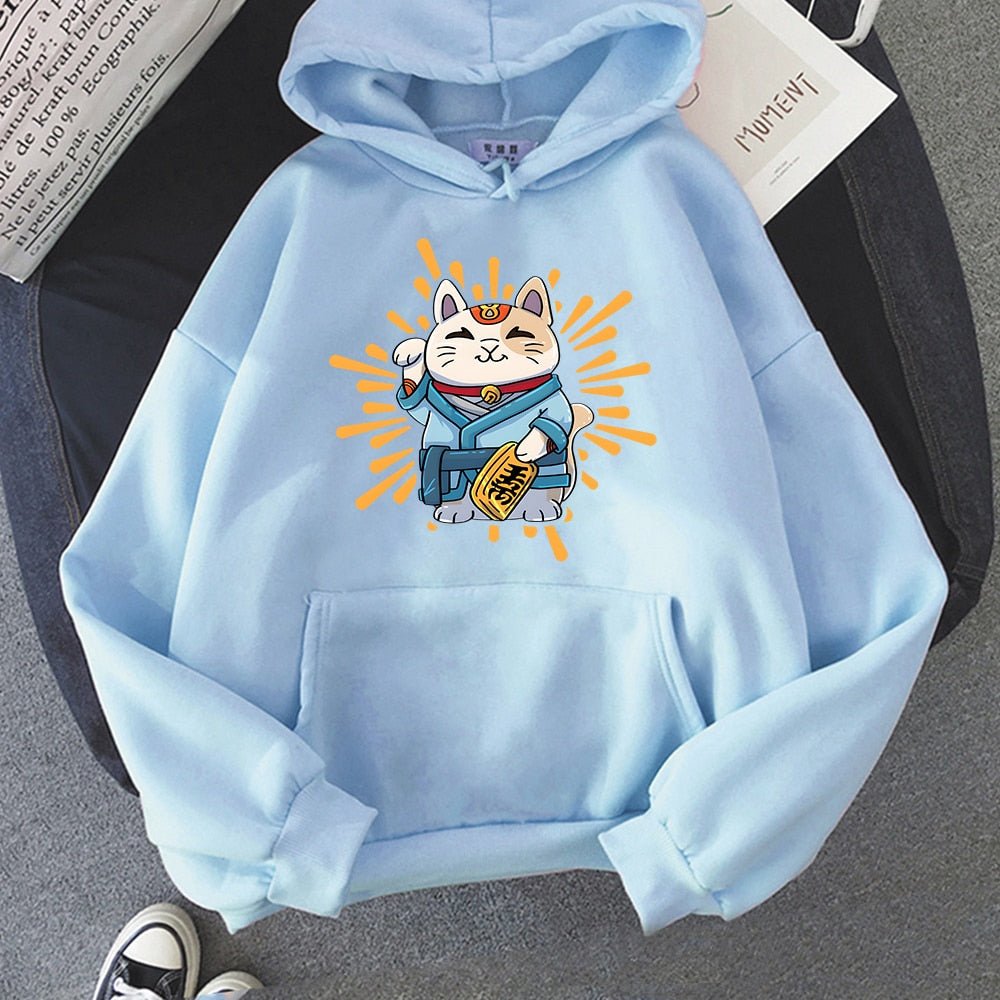 baby blue color hoodie with  a picture of a lucky cat in a japanese outfit smiling and waving