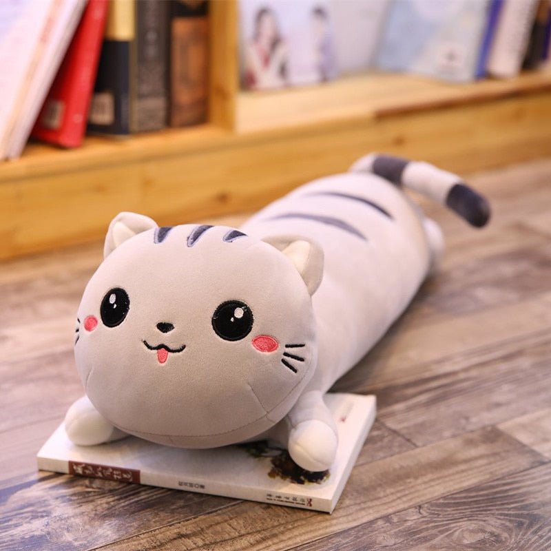a kawaii cat plushie of a gray cat for snuggling