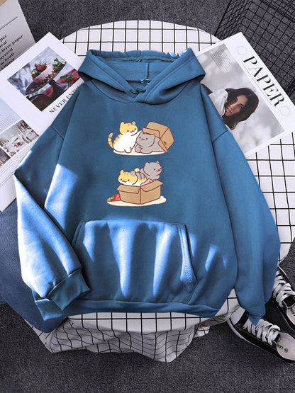 a haze blue hoodie with cute cat designs that comes with a pouch for casual wear 