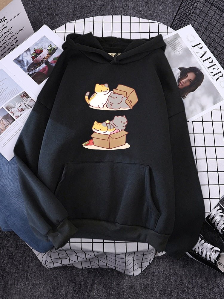 a black color hoodie made for cat dad with cute cats playing box hide and seek printed on it