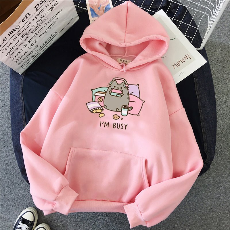 pink color cat hoodie showing a pusheen cat busy with his game and listening to music with a quote i am busy