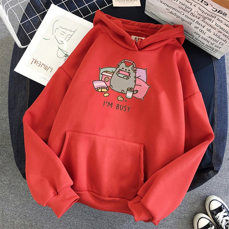 red color cute cat themed hoodie featuring a busy cat playing switch and listening to music