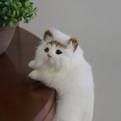 "I am stuck!" Adorable realistic cat plush