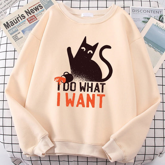 a beige color black cat sweater with naughty cat design