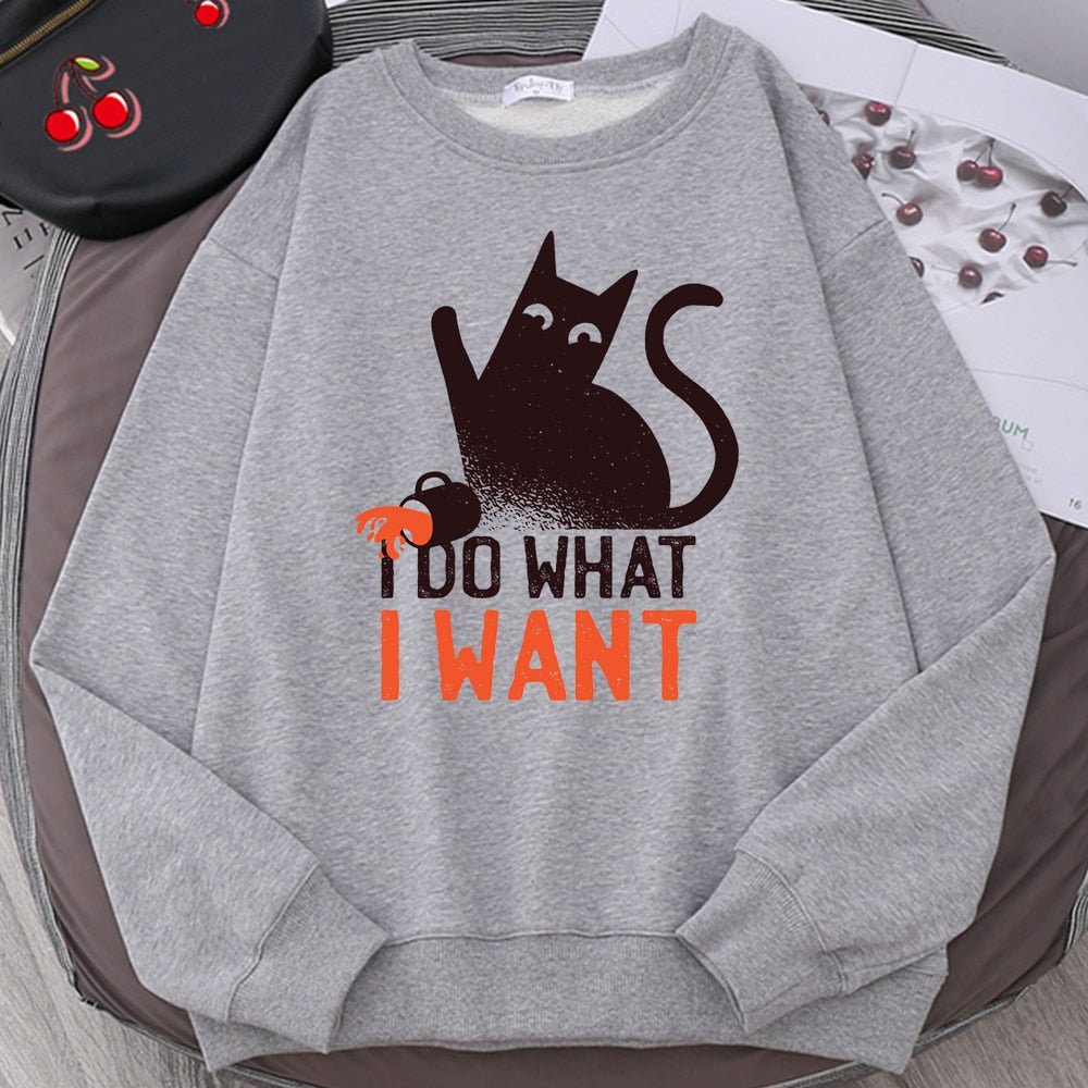a grey color funny cat sweatshirt with a picture of cat pushing a mug full of water