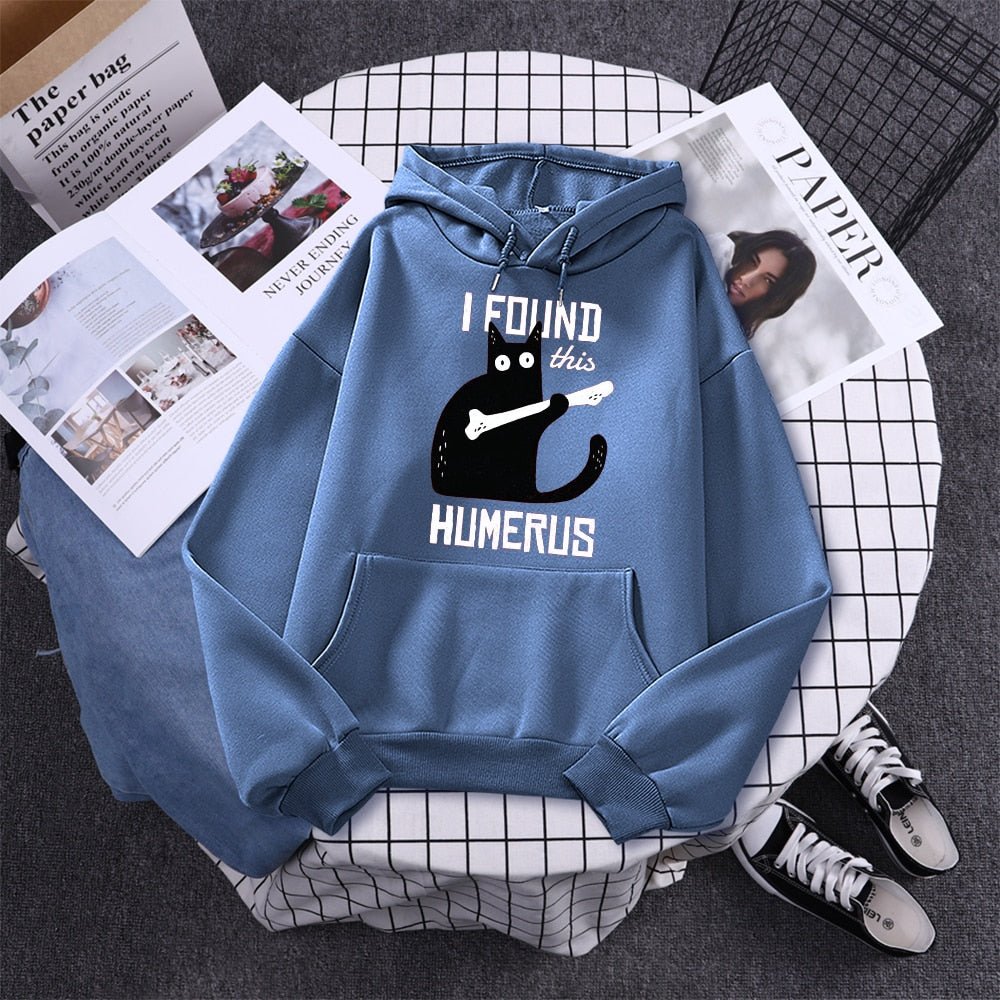 haze blue hoodie made for cat lover that looks hilarious and funny with a picture of a black cat holding a bone