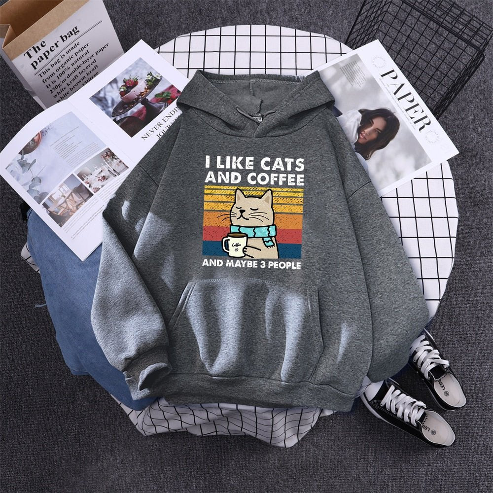 dark gray cat hoodie that looks funny with a cat having its morning coffee while sending a message that cats do not like people