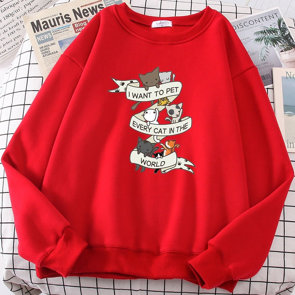 a red color cat pattern sweater with the word I want to pet every cat in the world