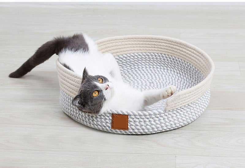 bohemian style cat bed with a woven texture in white color