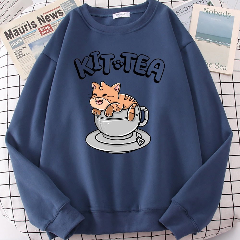 a blue color sweatshirt with cat in a tea pot design