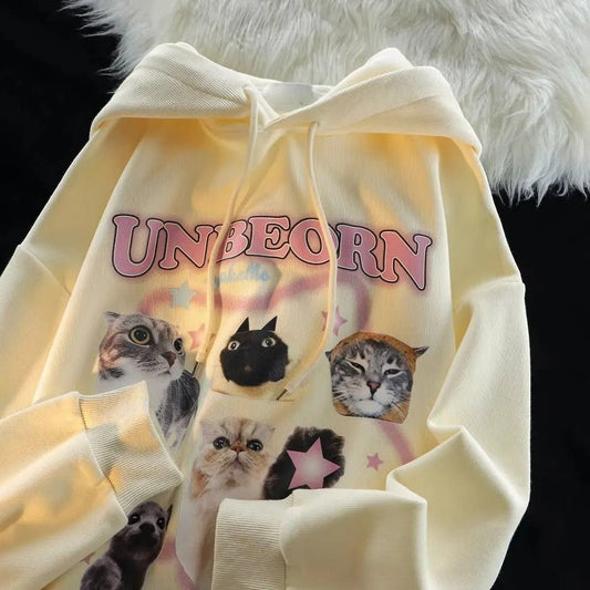 Kawaii cat compilation on a playful starry background hoodie.
