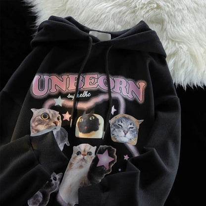 Bread-faced cats on a stylish black hoodie.