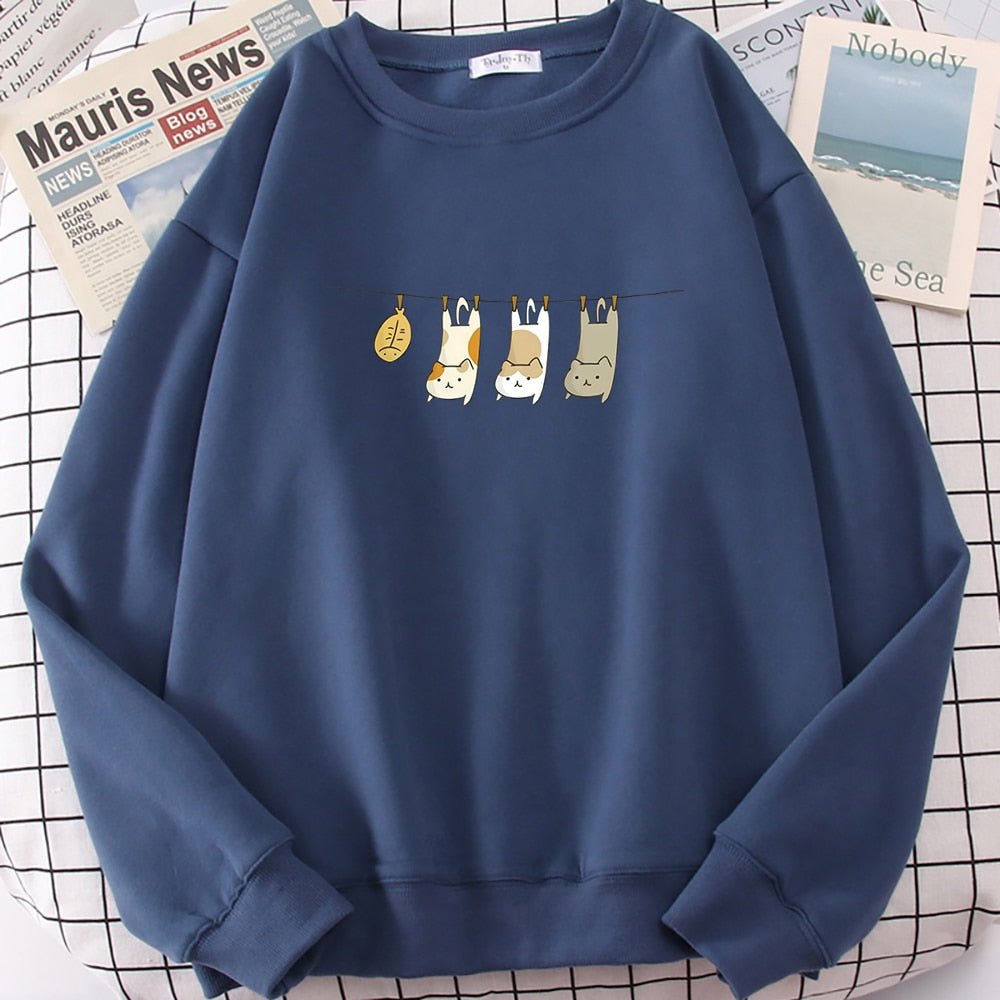 a blue color cat themed sweatshirts with laundry cats and fish
