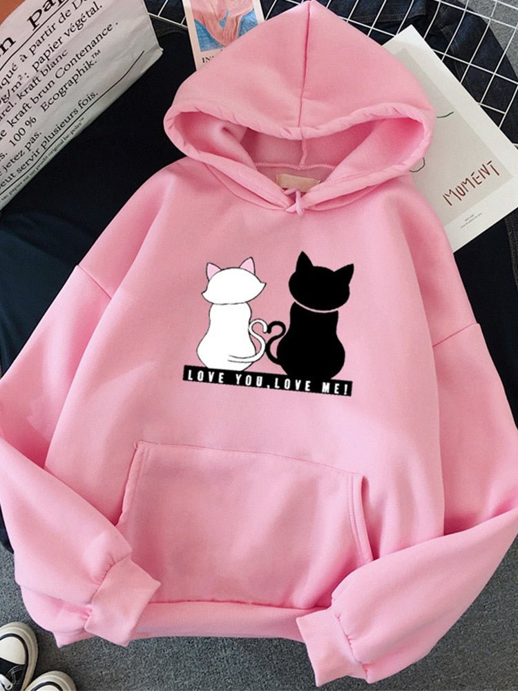pink color hoodie for cat moms with a picture of a black cat and a white cat in love