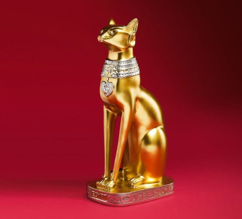 a golden cat statue for home decor
