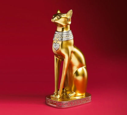 a golden cat statue for home decor