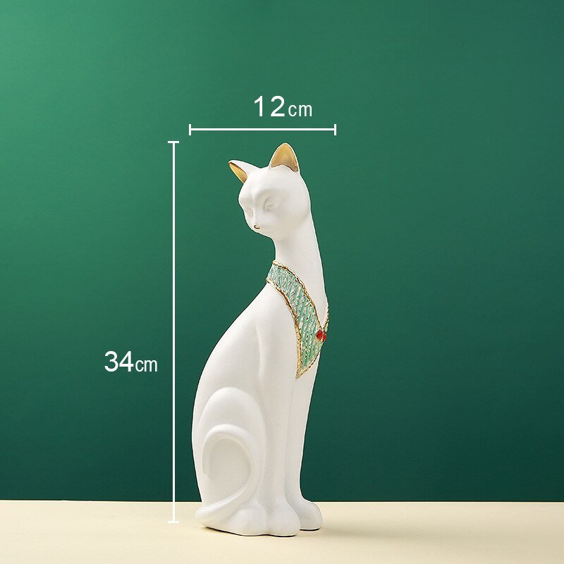 a white cat sculpture with egyptian nordic design 