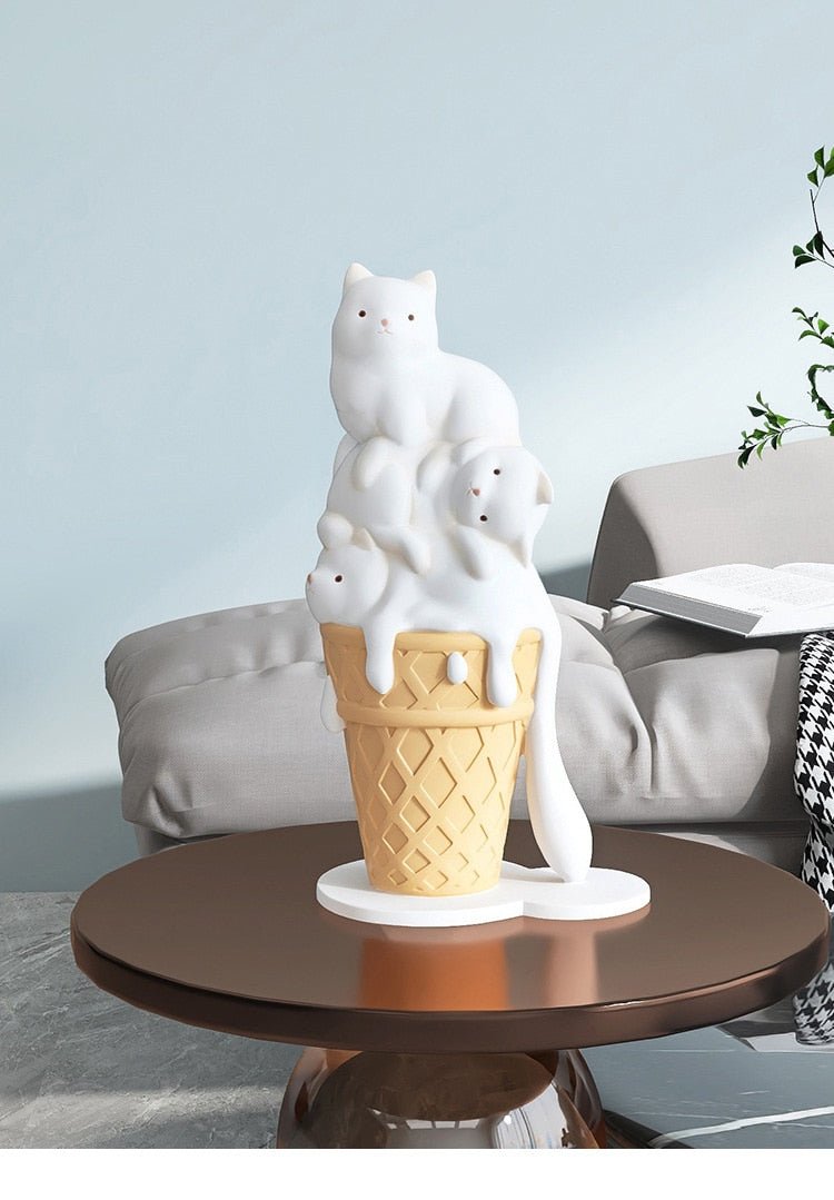 a home decor of a funny cat statue, featuring melting cat on ice cream cone