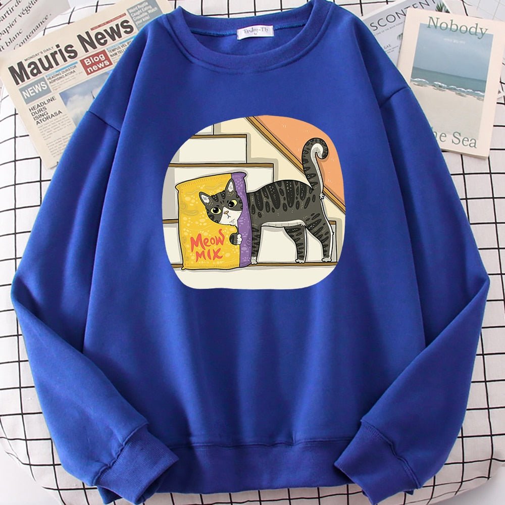 a blue color sweatshirts with cats on them hiding behind cat food
