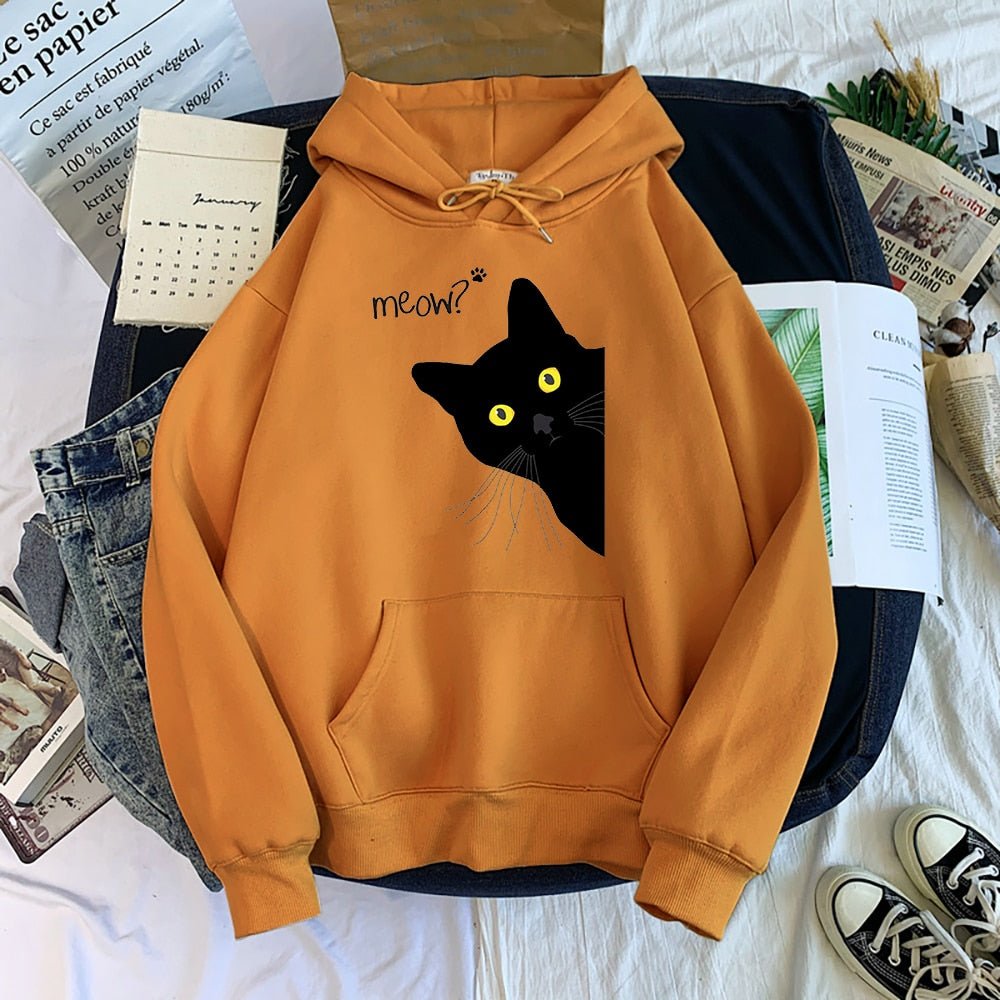 brown color hoodie with a cute picture of a black cat peeping from the side