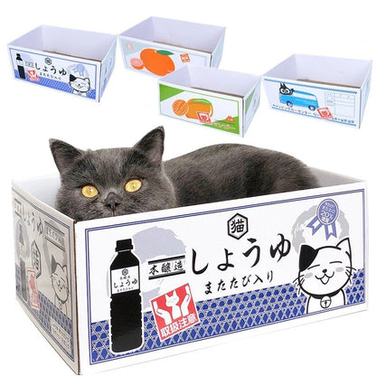cat sleeping in a cute milk carton style cat bed that comes in multiple colors