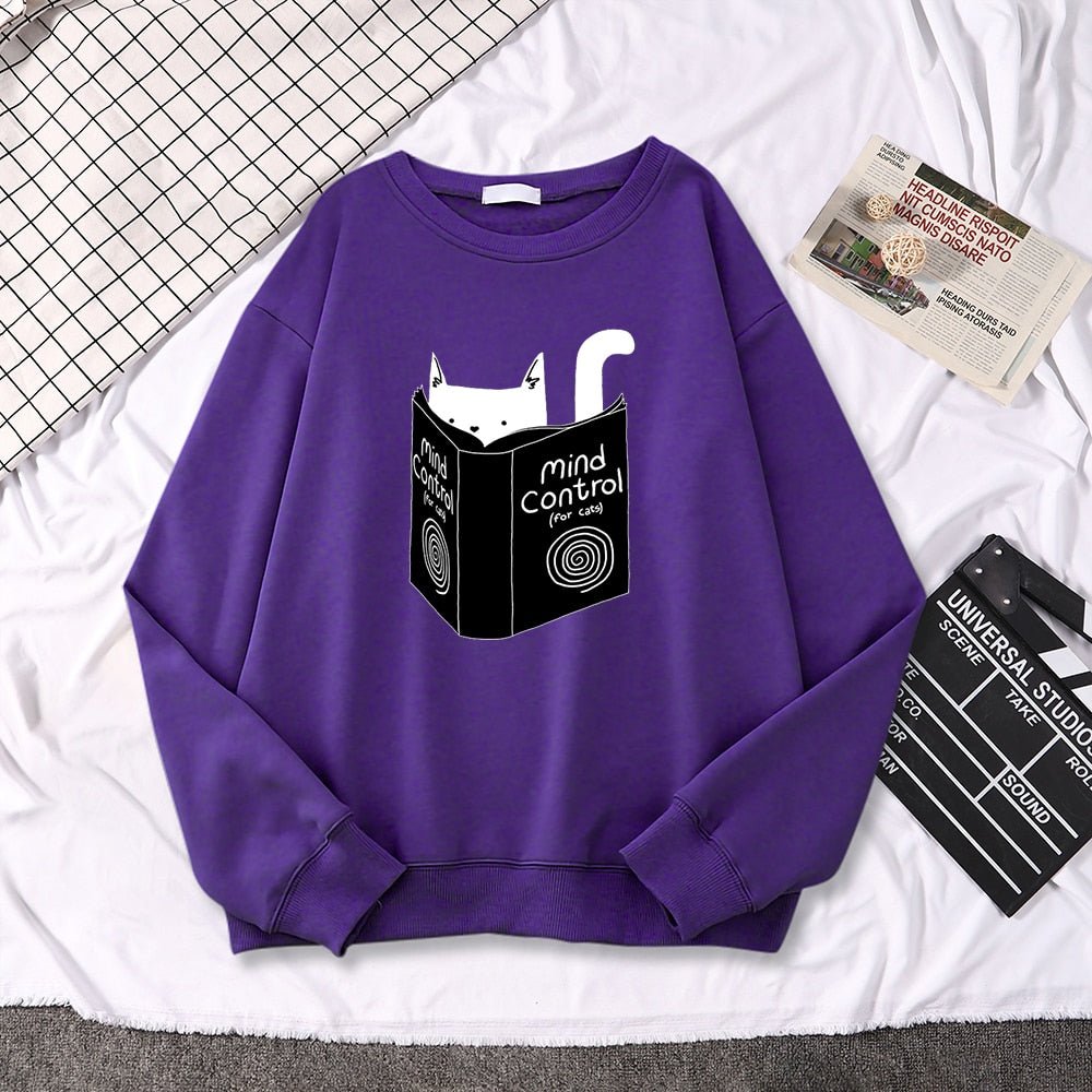 a purple cat print sweatshirt with a cat reading a book picture made from high quality material