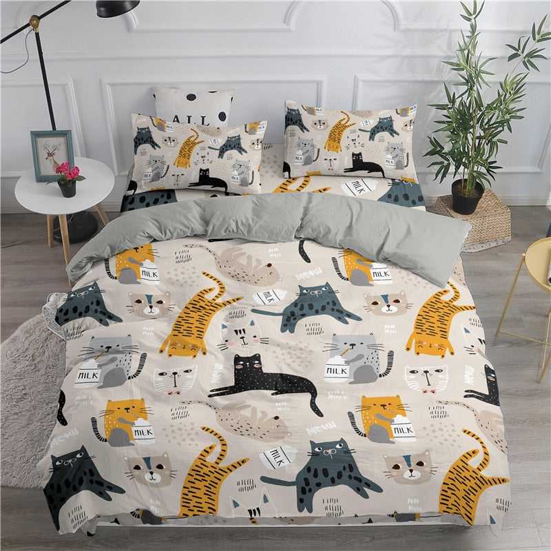 queen size duvet set in peach color with playful designs of cats from different breeds that looks cute and adorable