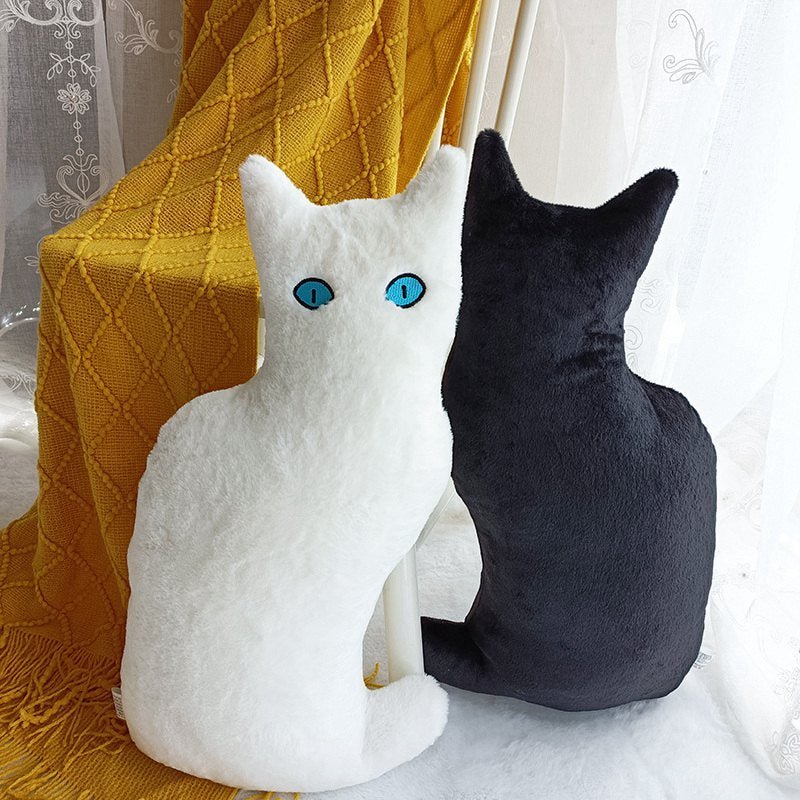 a black and white cat plush for cuddling