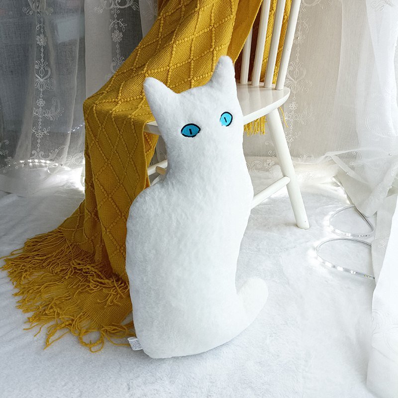a white plushie cat for pillow