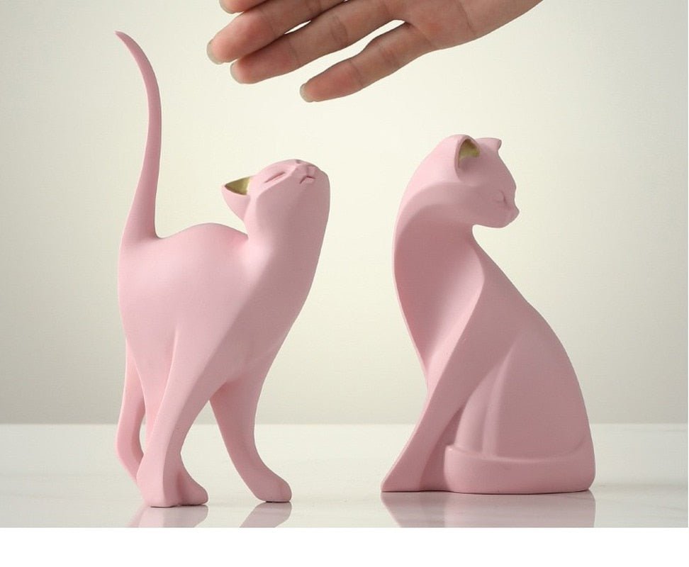 a playful cat sculptures for home decor in minimalist design