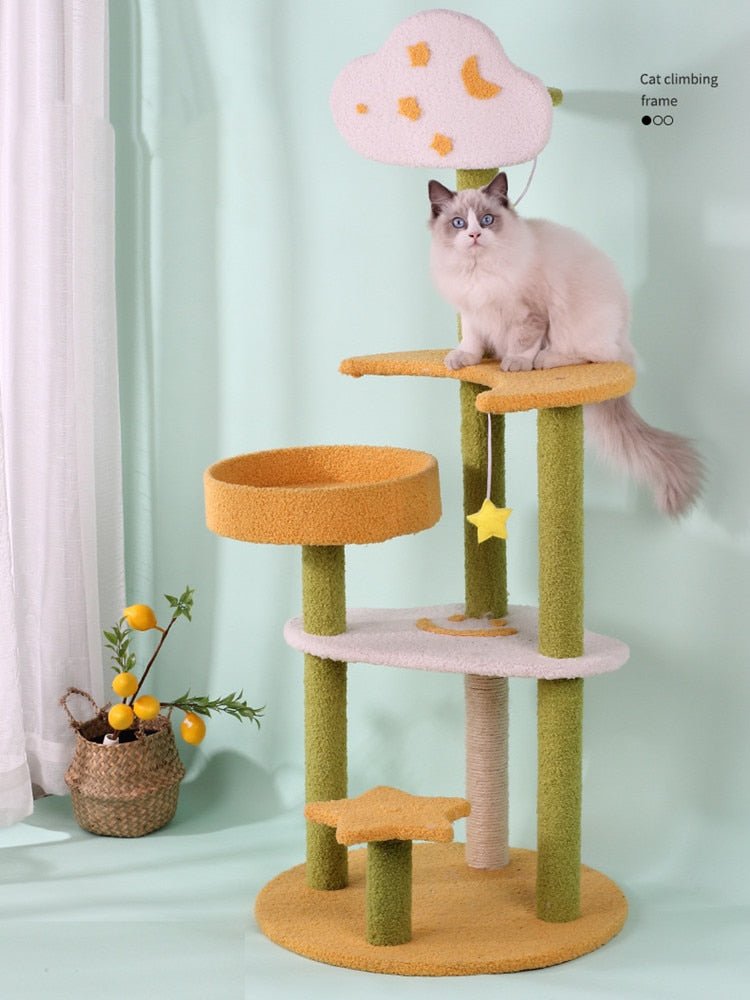 a cat sitting on a deluxe cat tree